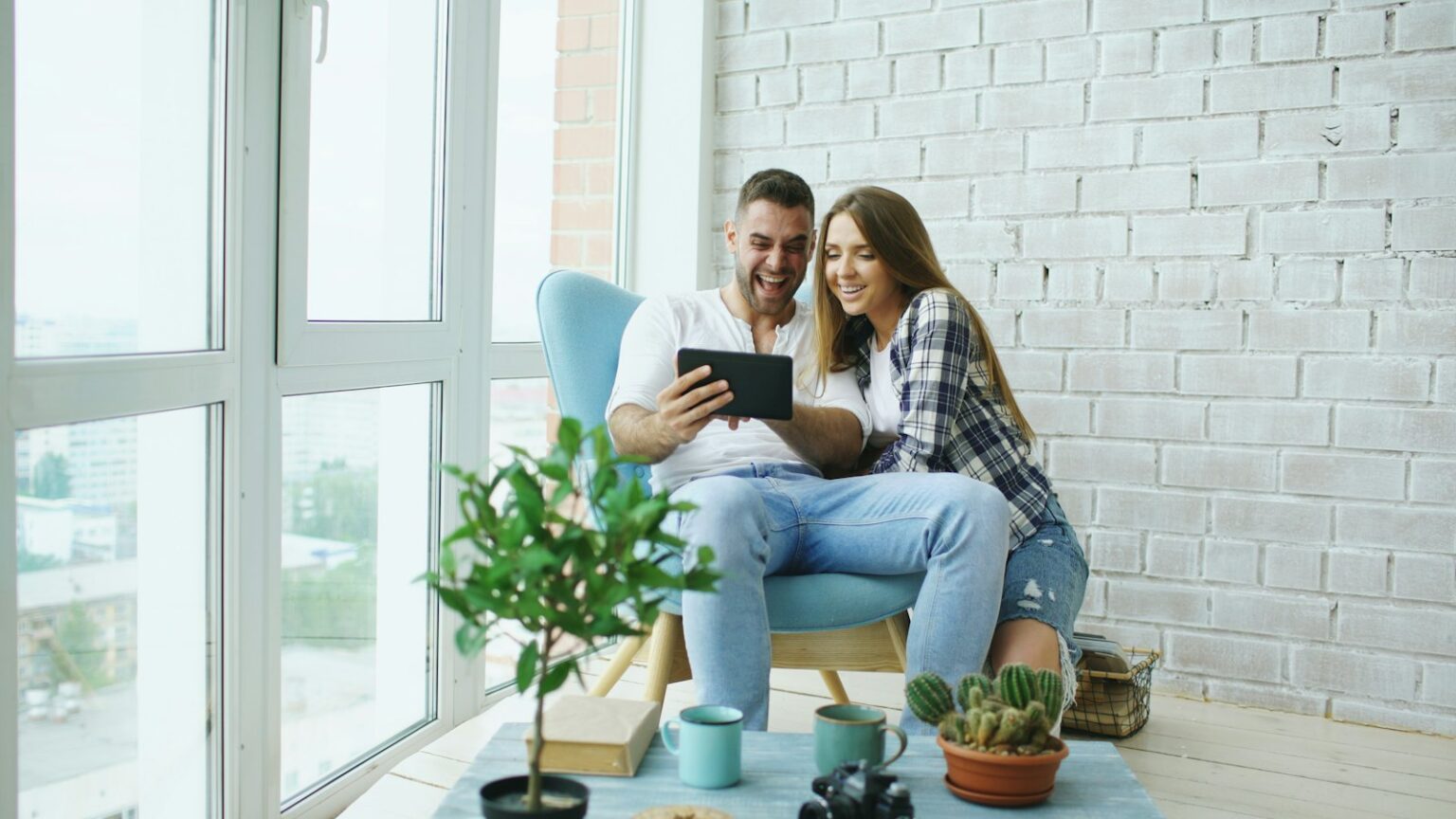 Couple reviewing a rental on a tablet